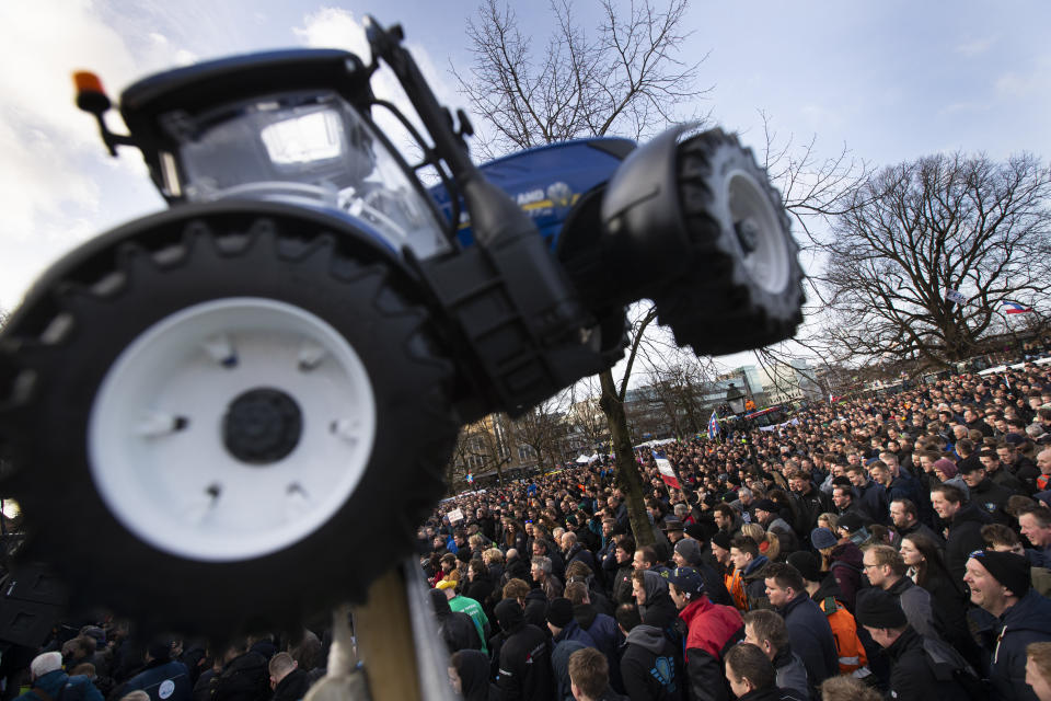 Some thousand of farmers converge on The Hague, Netherlands, Wednesday, Feb. 19, 2020, in the latest protest against the government's plans to rein in emissions of nitrogen oxide. (AP Photo/Peter Dejong)