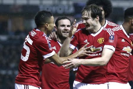 Football Soccer - Derby County v Manchester United - FA Cup Fourth Round - iPro Stadium - 29/1/16. Daley Blind celebrates with team mates after scoring the second goal for Manchester United Reuters / Eddie Keogh Livepic