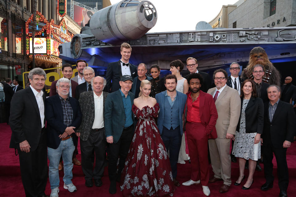 <p>(Back Row) Jonathan Kasdan, Simon Emanuel, Lawrence Kasdan, Joonas Suotamo, Woody Harrelson, Thandie Newton, Phoebe Waller-Bridge, Paul Bettany, John Powell, Jason McGatlin, Chewbacca, (Front Row) Alan Horn, George Lucas, Clint Howard, Ron Howard, Emilia Clarke, Alden Enrenreich, Donald Glover, Jon Favreau, Kathleen Kennedy, Alan Bergman pose together at the world premiere of ÒSolo: A Star Wars StoryÓ in Hollywood on May 10, 2018..(Photo: Alex J. Berliner/ABImages). </p>