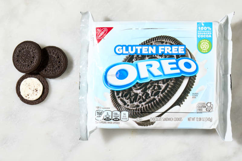 overhead shot of the gluten free classic oreos with a few cookies laying down next to the box