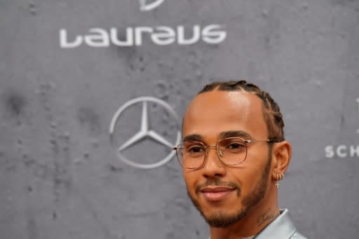 Lewis Hamilton won the joint Laureus world sportsman of the year award on Monday in Berlin alongside footballer Lionel Messi