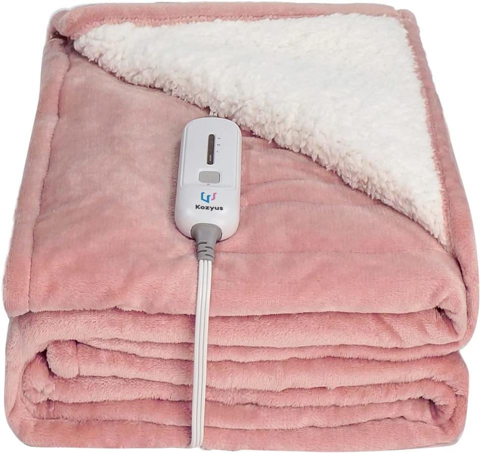 Kozyus Electric Heated Blanket Throw in pink (Photo via Amazon Canada)