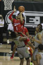 Texas Tech guard Terrence Shannon Jr. (1) attempts a shot past Baylor guard Adam Flagler (10) in the first half of an NCAA college basketball game Sunday, March 7, 2021, in Waco, Texas. (AP Photo/Jerry Larson)