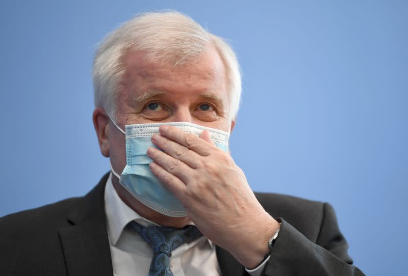 German Interior Minister Horst Seehofer attends a news conference, in Berlin