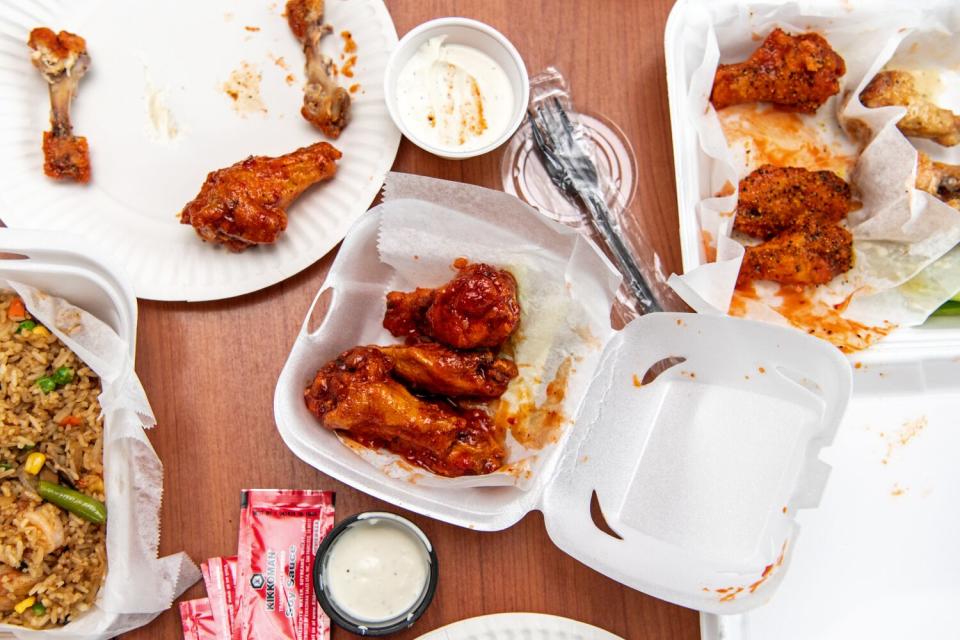 A takeout container of chicken wings.