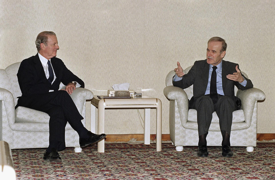 Baker, left, talks with Syrian President Hafez al-Assad before their meeting in Damascus in March 1991. 