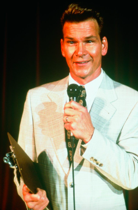 Patrick Swayze wearing a suit