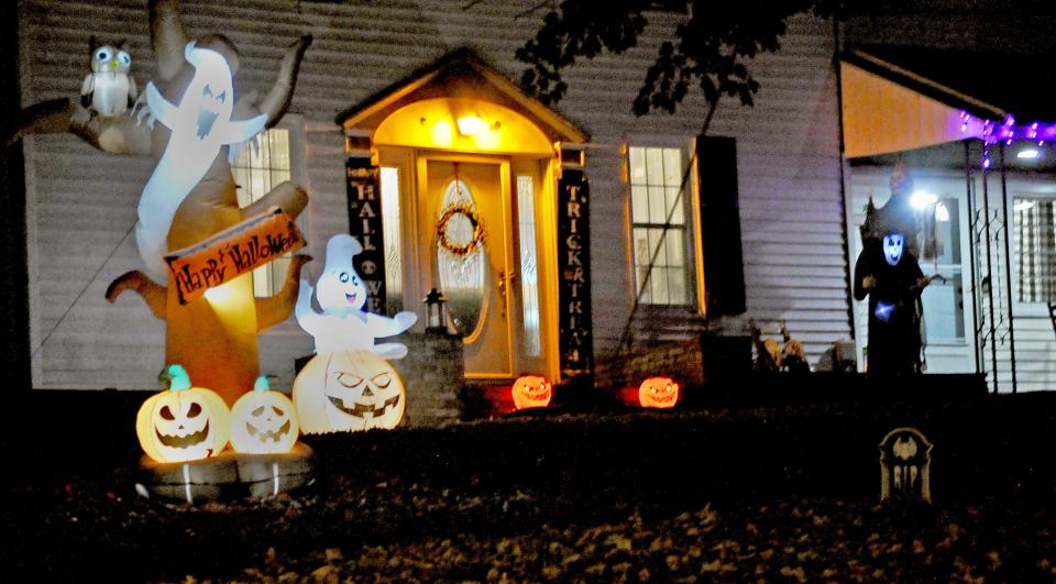 A Halloween display shines brightly in Apple Creek.