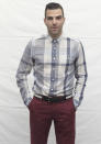 Zachary Quinto worked spring fashion in a checked shirt and coloured trousers.