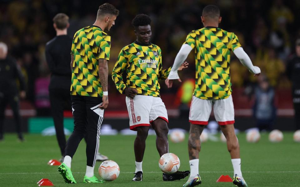 Arsenal's Bukayo Saka and Ben White - Action Images via Reuters