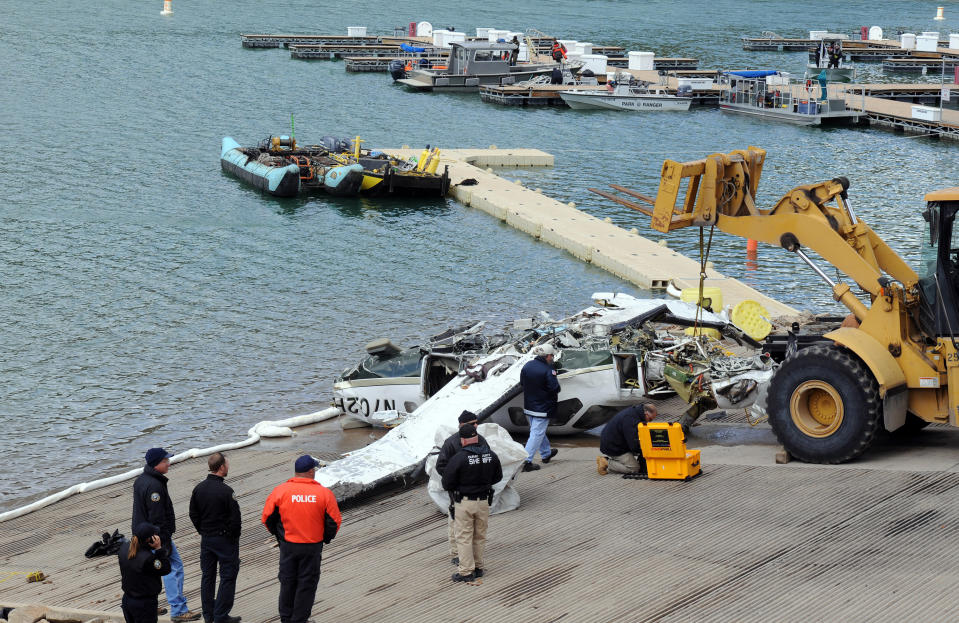 This photo provided by Ouray County shows the aircraft after it was recovered with the five victims on Thursday March 27, 2014, at the Ridgway Reservoir near Ridgway, Colo., The plane crashed last Saturday, March 22, 2014, killing five people from Alabama. (AP Photo/Ouray County, William Woody)