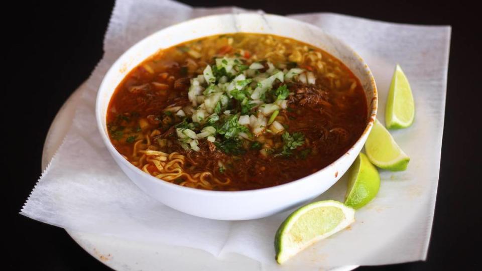 A bowl of ramen and birria at El Cid.