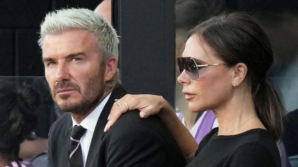 David and Victoria Beckham watch an MLS game together from a private box. Pic: Getty