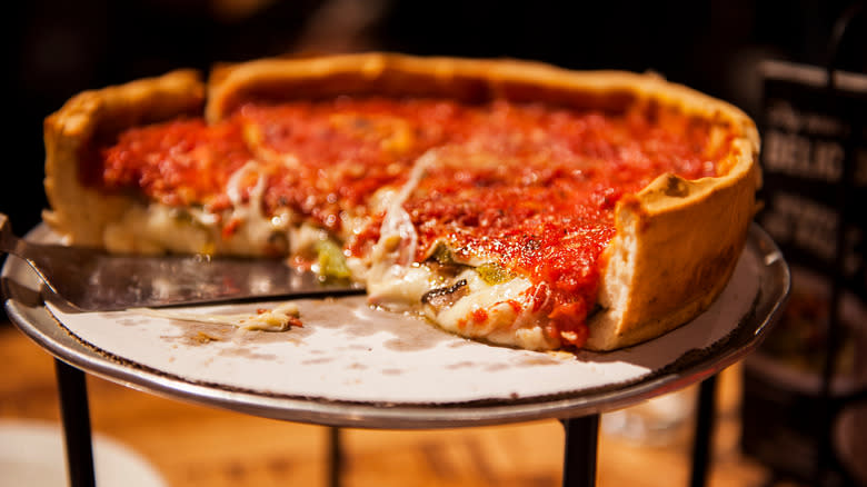 Deep dish pizza on platter