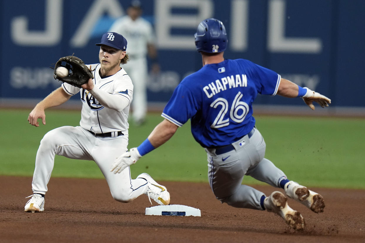 The Tampa Bay Rays and Toronto Blue Jays are barreling toward the AL wild card slots alongside the Seattle Mariners. (AP Photo/Chris O'Meara)