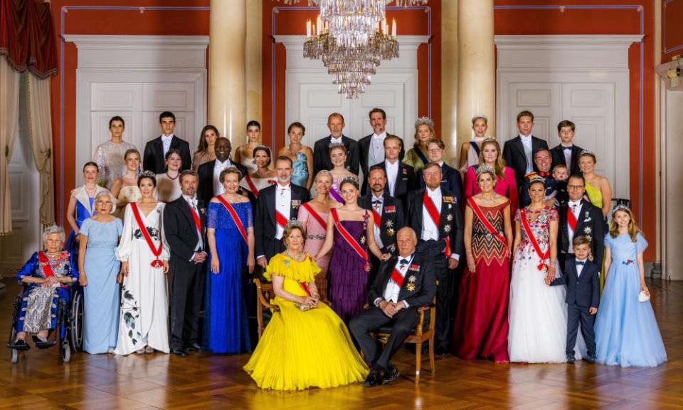 Princess Ingrid Alexandra (C) stands between her grandparents King Harald and Queen Sonja for a family photo to mark her Covid-delayed 18th birthday celebrations in Oslo in June 2022.