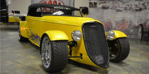 <p>Because it's built on a kit car platform, <a rel="nofollow noopener" href="http://www.barrett-jackson.com/Events/Event/Details/1933-FORD-CUSTOM-ROADSTER-193890" target="_blank" data-ylk="slk:this roadster;elm:context_link;itc:0;sec:content-canvas" class="link ">this roadster</a> is likely going to be a great bang-for-your-buck buy this weekend. Preconceived notions of kit builds aside, this car was shown at SEMA in 2010, has next to no miles on it, and runs a properly modern drivetrain including a supercharged 624-horsepower V-8 from <a rel="nofollow noopener" href="http://performance.ford.com/home.html" target="_blank" data-ylk="slk:Ford Racing;elm:context_link;itc:0;sec:content-canvas" class="link ">Ford Racing</a>, a five-speed manual gearbox, and other amenities you wouldn't get out of your typical hot rod.<br></p>