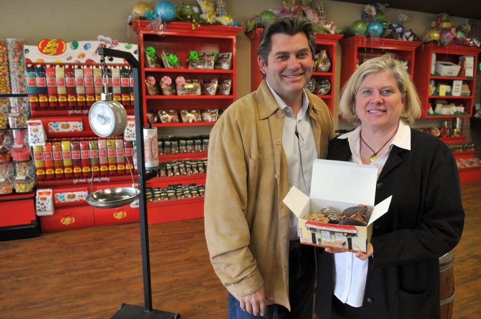 Tim Strickland stands alongside his sister, Jennifer, inside the River Street Sweets location in Habersham Village in this file photo.