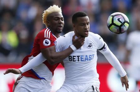 Britain Football Soccer - Swansea City v Middlesbrough - Premier League - Liberty Stadium - 2/4/17 Swansea City's Martin Olsson in action with Middlesbrough's Adama Traore Action Images via Reuters / Andrew Boyers Livepic