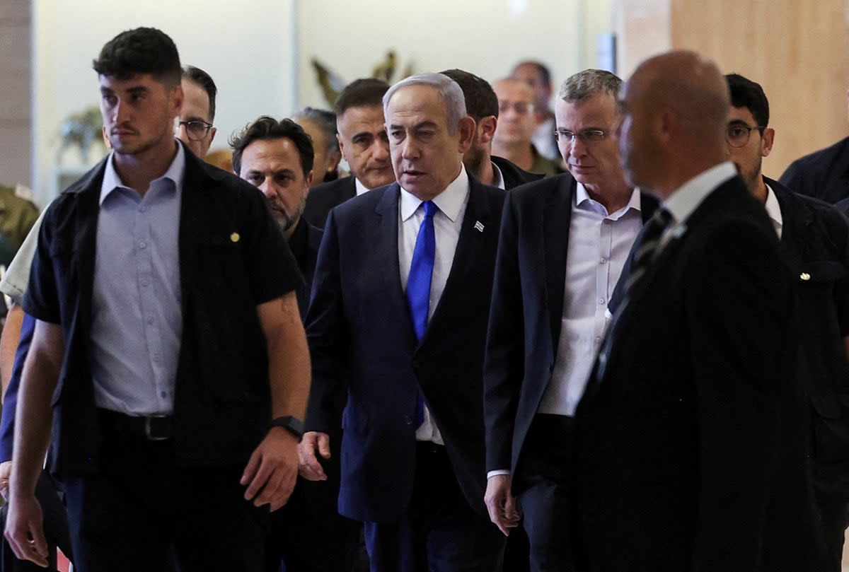 Israeli prime minister Benjamin Netanyahu arrives at his Likud party faction meeting at the Knesset, Israel’s parliament, after the ICC motion was made public  (Reuters)