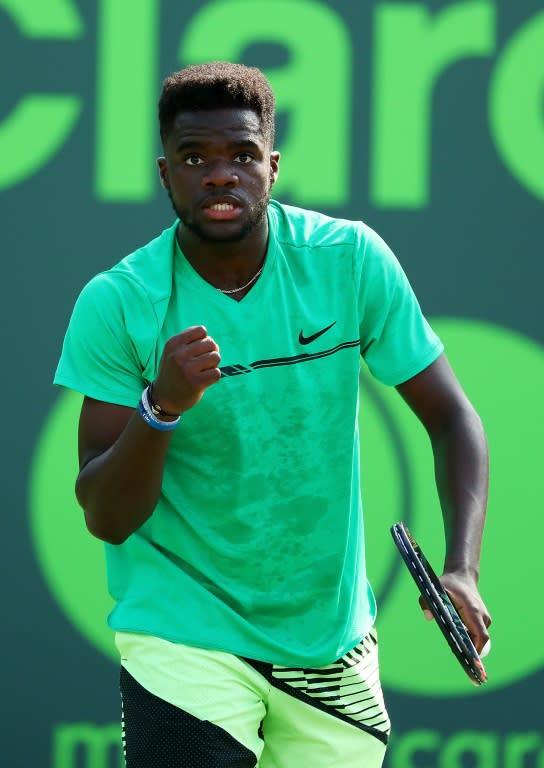 Frances Tiafoe of the US celebrates winning a point against Konstanin Kravchuk of Russia during their Miami Open first round match, at Crandon Park Tennis Center in Key Biscayne, Florida, on March 23, 2017