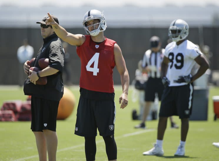 Derek Carr set a deadline of the start of training camp to get a contract extension done. (AP)