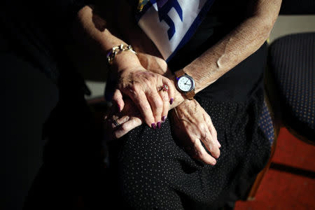 Holocaust survivors wait for the beginning of the annual Holocaust survivors' beauty pageant in Haifa, Israel October 14, 2018. REUTERS/Corinna Kern