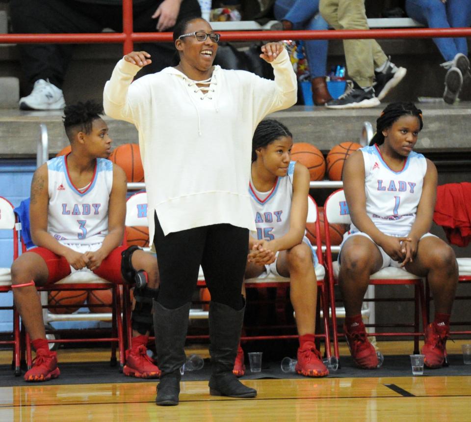 Hirschi coach Krataura Buckner reacts during a District 6-4A matchup with Graham at Hirschi Fieldhouse on Friday, Jan. 24, 2020.