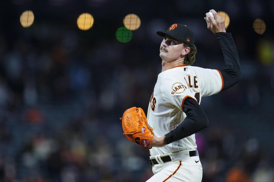 San Francisco Giants' Sean Hjelle pitches to a Colorado Rockies batter during the second inning of a baseball game in San Francisco, Wednesday, Sept. 28, 2022. (AP Photo/Godofredo A. Vásquez)