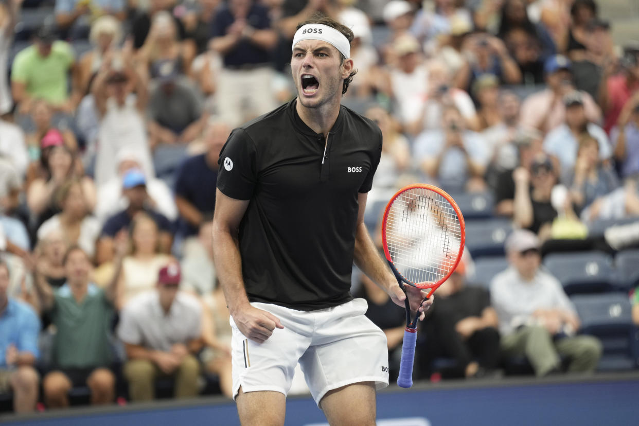 Taylor Fritz, of the United States, reacts after defeating Casper Ruud, of Norway, during the fourth round of the U.S. Open tennis championships, Sunday, Sept. 1, in New York. 2024. (AP Photo/Eduardo Munoz Alvarez)