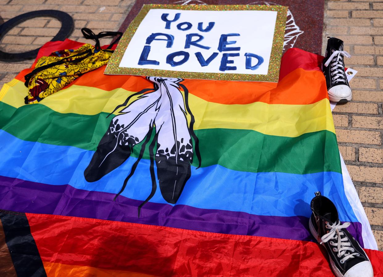 A flag is pictured at Owasso High School in Owasso, Okla., on Feb. 26, 2024, as students and community members gathered to call for better protections for LGBTQ+ students.