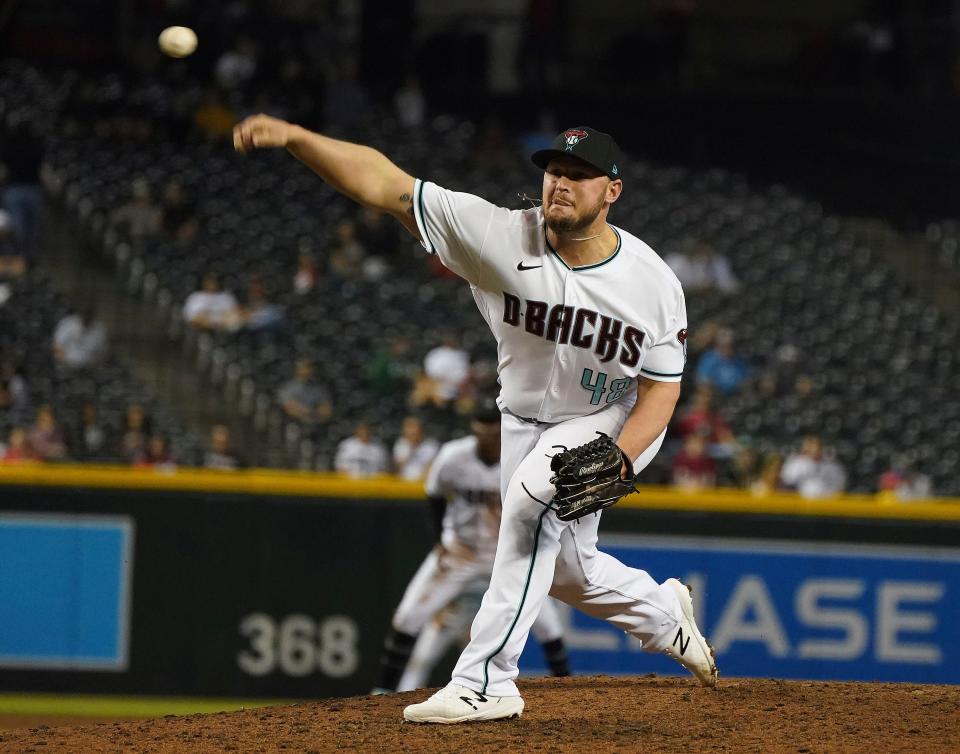 Arizona Diamondbacks pitcher J.B. Wendelken (48), a South Effingham High School graduate, delivers a pitch against the Colorado Rockies during a game Oct 1, 2021, in Phoenix.