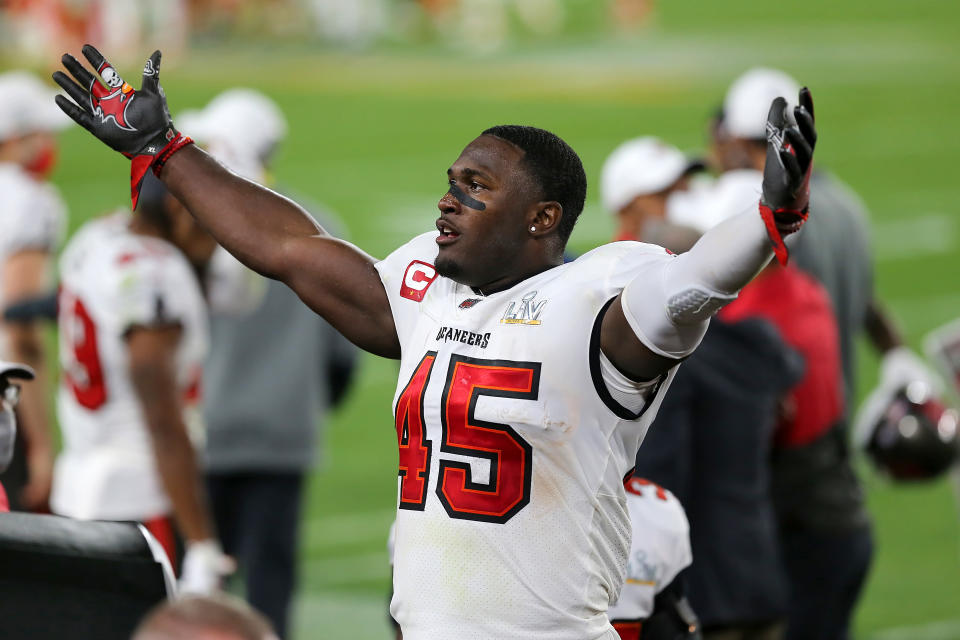 TAMPA, FL - FEBRUARY 07: Devin White (45) of the Buccaneers appeals to the fans to cheer louder during the Super Bowl LV game between the Kansas City Chiefs and the Tampa Bay Buccaneers on February 7, 2021 at Raymond James Stadium, in Tampa, FL. (Photo by Cliff Welch/Icon Sportswire via Getty Images)