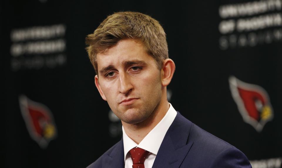 Arizona Cardinals first-round NFL football draft pick Josh Rosen pauses as he listens to a question during a news conference Friday, April 27, 2018, in Tempe, Ariz. (AP Photo/Ross D. Franklin)