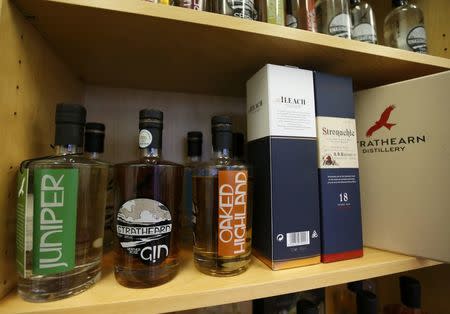 Whisky and gin are seen for sale at the Strathearn Distillery, Methven, Scotland, Britain December 13, 2016. REUTERS/Russell Cheyne