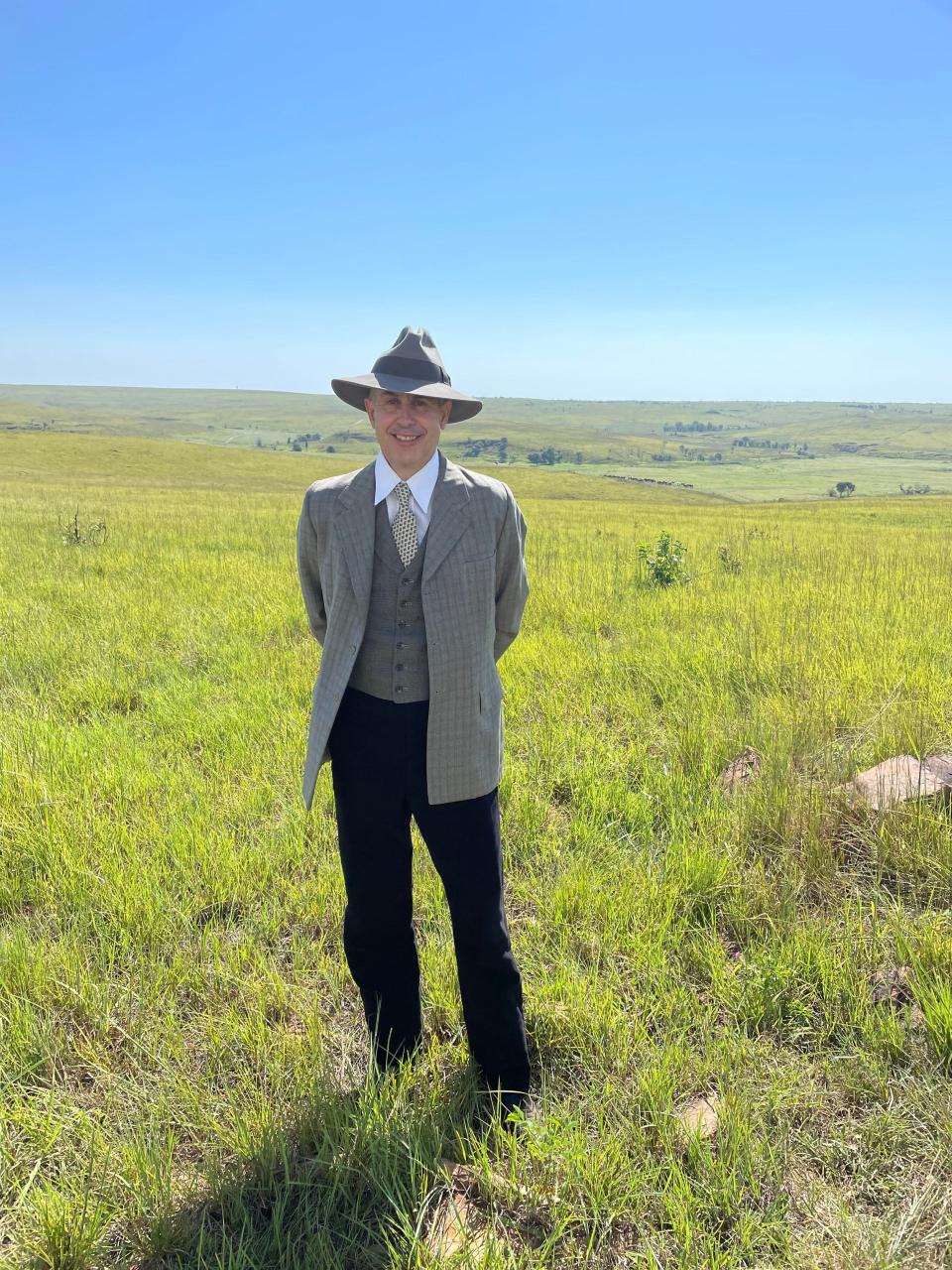 Oklahoma City resident Edward Knight poses in costume behind the scenes of the movie "Killers of the Flower Moon," which filmed in and around Osage County in 2021. Knight, who is the composer in residence and director of music composition at Oklahoma City University, was picked to be an extra twice on the film, portraying a U.S. marshal as well as a concerned citizen at a pivotal meeting at William K. Hale's (Robert De Niro) ranch house.