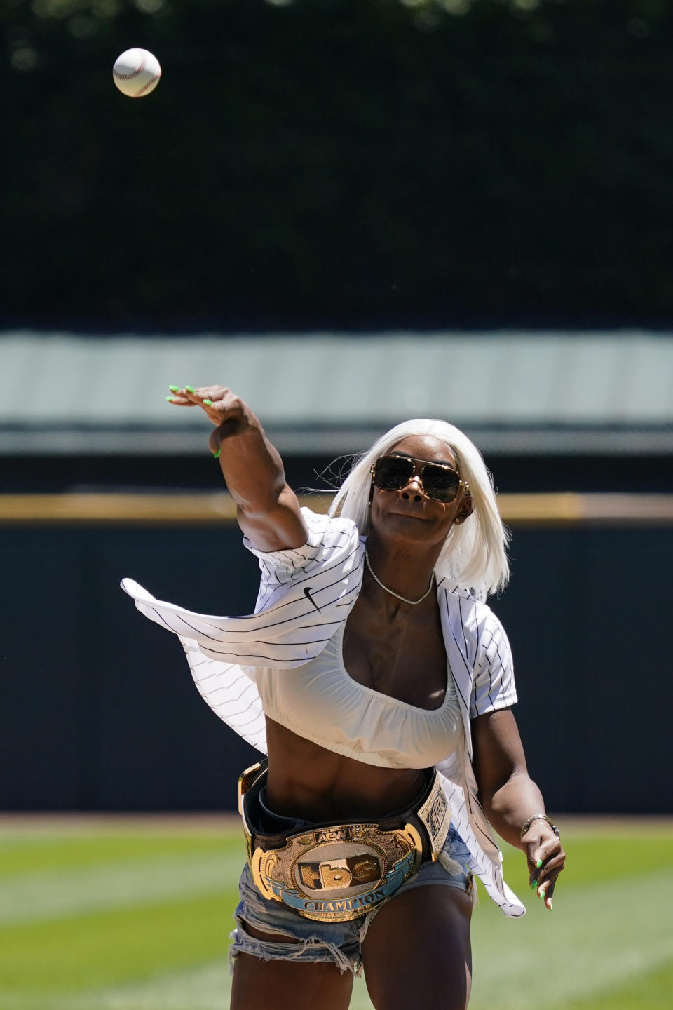 FILE - Professional wrestler Jade Cargill throws out a ceremonial first pitch before a baseball game between the Baltimore Orioles and the Chicago White Sox in Chicago, Sunday, June 26, 2022. Majority ownership in major North American pro sports by anyone other than white men is rare. Though Phillips and Cargill don't own an NFL, NBA or Major League Baseball team, they still take pride in showing that Black entrepreneurs can successfully call the shots. The duo owns professional fastpitch softball team the Texas Smoke. (AP Photo/Nam Y. Huh, File)