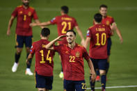 Spain's Pablo Sarabia, centre, celebrates after scoring his side's fourth goal during the World Cup 2022 group B qualifying soccer match between Spain and Georgia at the Nuevo Estadio Vivero in Badajoz, Spain, Sunday, Sept. 5, 2021. (AP Photo/Jose Breton)
