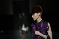 A model wears a creation as part of the Prada women's Fall-Winter 2024-25 collection presented in Milan, northern Italy, Thursday, Feb. 22, 2024. (AP Photo/Luca Bruno)