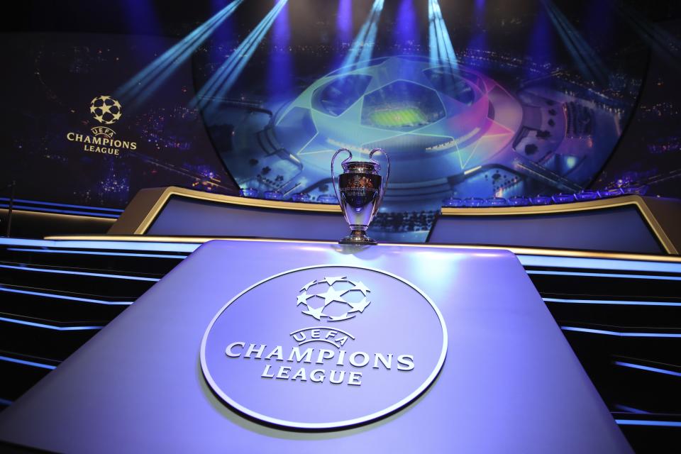 The Champions League trophy is displayed before the UEFA group stage draw at the Grimaldi Forum, in Monaco, Thursday, Aug. 29, 2019. (AP Photo/Daniel Cole)