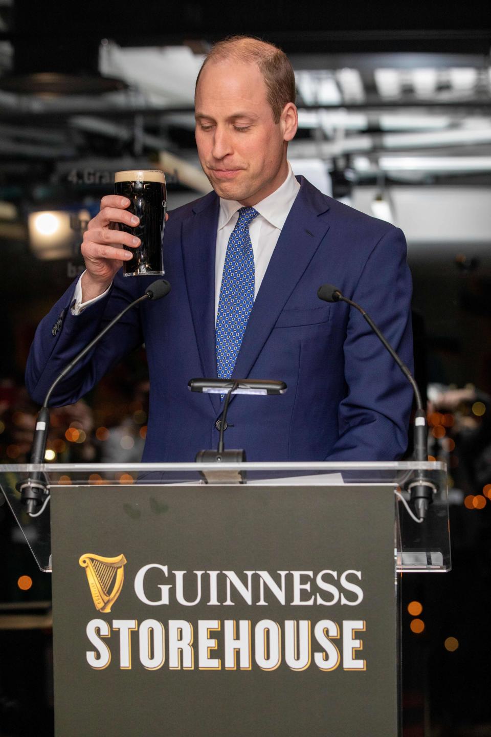 Britain's Prince William, Duke of Cambridge holds a pinto f Guinness as he attends a special reception at the Guinness Storehouses Gravity Bar in Dublin on March 3, 2020 on the first day of their Royal Highnesses three-day visit. (Photo by PAUL FAITH / POOL / AFP) (Photo by PAUL FAITH/POOL/AFP via Getty Images)