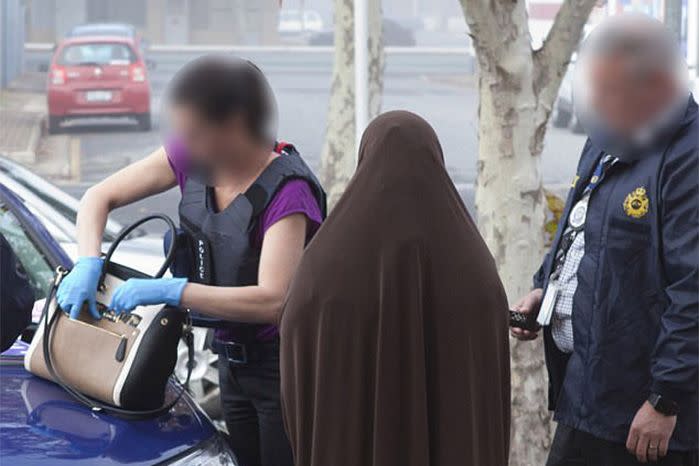 The AFP released footage of the Adelaide woman's arrest on Tuesday. Source: AFP