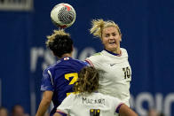United States' Lindsey Horan (10) and Japan's Moeka Minami (3) go up for a head ball during the second half in a SheBelieves Cup women’s soccer game, Saturday, April 6, 2024, in Atlanta. The United States won 2-1. (AP Photo/Mike Stewart)