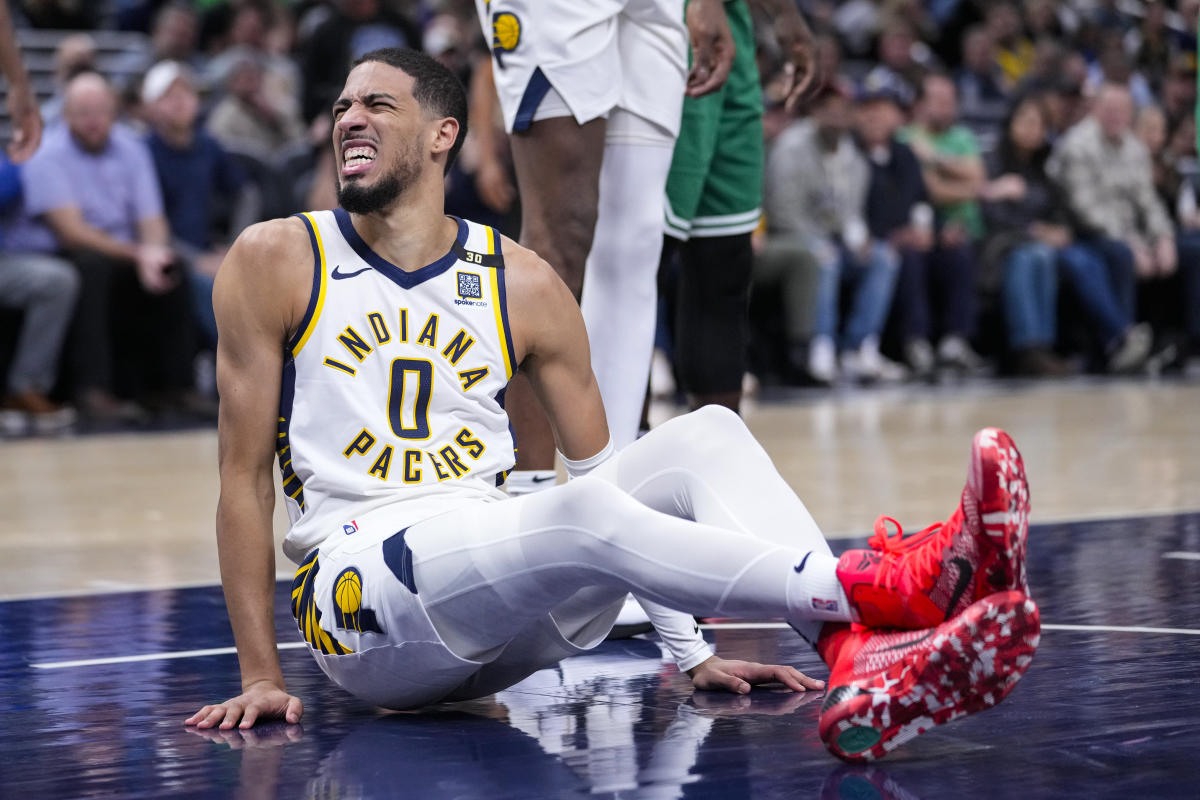 Pacers star Tyrese Haliburton carried off after awkward fall, splits in win over Celtics