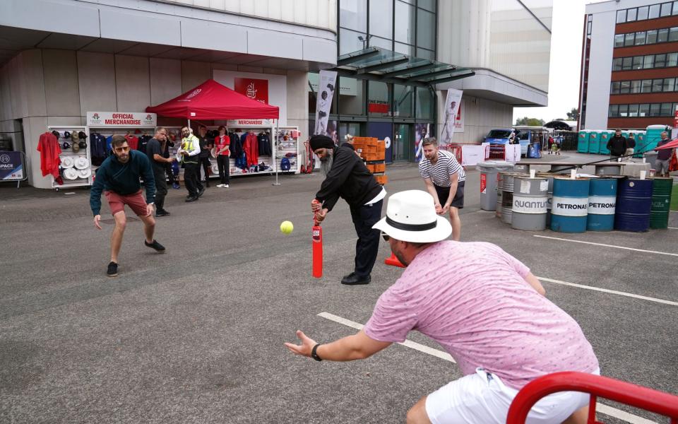 Fans had to create their own entertainment at Old Trafford after the fifth Test was cancelled on the first day - PA