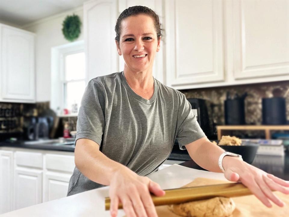 Virginia Voss, Pupcakery creator, rolls out the dough for some Puptreats.