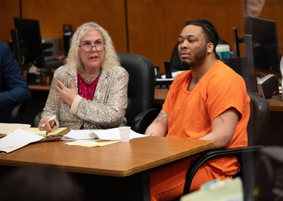 Defense attorney Linda Parisi questions a witness on Friday as murder suspect Dandrae Martin listens in Sacramento Superior Court during a preliminary hearing in the case of the April 2022 downtown Sacramento mass shooting.