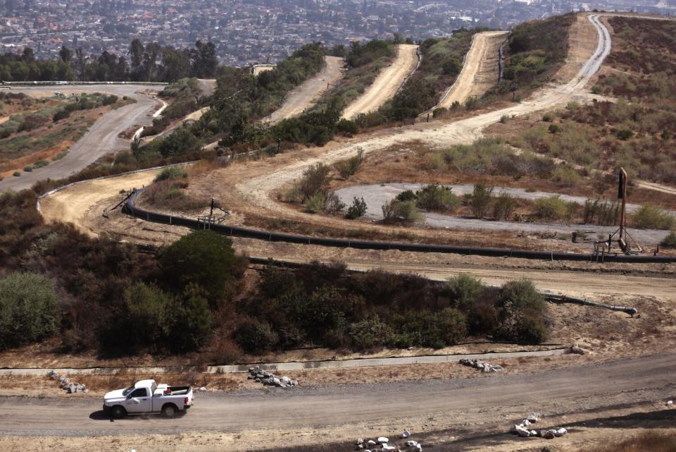 A truck drives through the former Puente Hills Landfill.