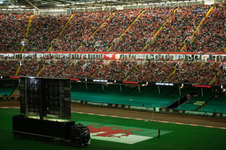 From inside the Millennium Stadium in Cardiff, Wales fans watch a live broadcast of their team playing against Portugal in their Euro 2016 semi-final match in Lyon, on July 6