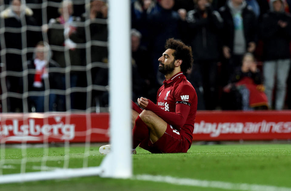 LIVERPOOL, ENGLAND - APRIL 26: (THE SUN OUT, THE SUN ON SUDNAY OUT) Mohamed Salah of Liverpool celebrates after scoring during the Premier League match between Liverpool FC and Huddersfield Town at Anfield on April 26, 2019 in Liverpool, United Kingdom. (Photo by John Powell/Liverpool FC via Getty Images)